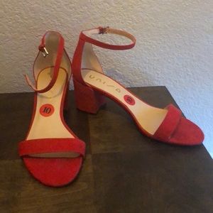 Red strap, low heel sandals. Worn once.